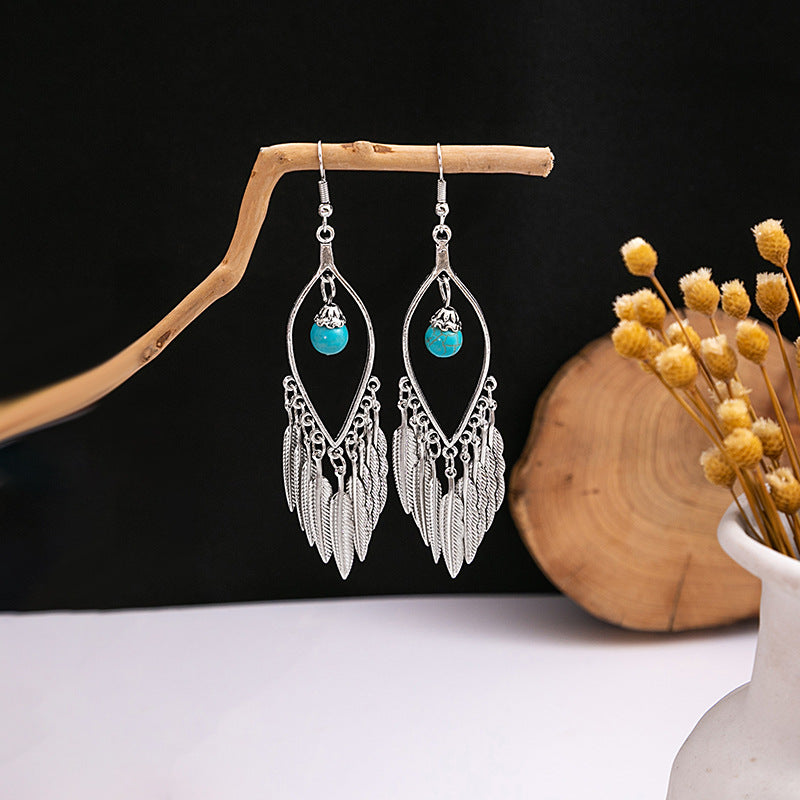 Wholesale Hollow Circular Flower Tassel Alloy Earrings